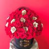 Large round box of red and white roses