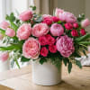 A beautiful handmade arrangement of Premium Florals for the Mom in your