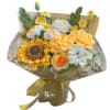A bouquet featuring gold crochet flowers, including sunflowers, roses, and various blossoms