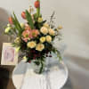 Beautiful tulip bouquet with cream roses, spray roses, chrysanthemums and fresh garden