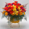 The contrasting colors of yellow, orange, and red in this arrangement create