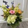 A vibrate eye catching arrangement designed to feel like a burst of