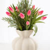 A modern tulip arrangement in Myrtle Beach featuring soft blush pink tulips