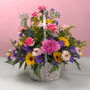 Our Celebrating You Basket is a joyful floral arrangement, a great choice
