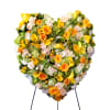 Heart-shaped floral spray with yellow calla lilies and roses