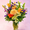 Bright, fresh, and bursting with cheerful color, Citrus Garden blends vibrant orange