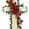 Cross-shaped floral spray with red roses and white chrysanthemums
