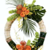 Tropical floral wreath with orange roses and green foliage
