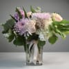Each arrangement is custom designed, using seasonal, best-of-day blooms. The image shown