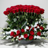 A breathtaking luxury arrangement featuring 75 premium red roses, designed in a