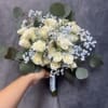 Blue ice prom bouquet with white spray roses and light blue baby