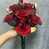 Prom red , gold and black bouquet made with red roses 