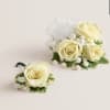 This elegant corsage and boutonniere set is thoughtfully designed to pair perfectly