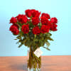 Bouquet of red roses in a clear glass vase