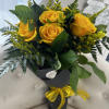 Elevate your gifting experience with the Dozen Yellow Roses Wrapped Bouquet by