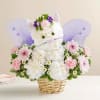 Flower basket arranged as a white cat with purple butterfly wings