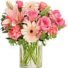 Pink mixed bouquet in a clear glass vase