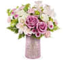 Pink and white flower bouquet in a tall vase