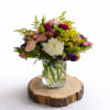 A lively, garden-fresh petite beauty arrangement that brings cheerful color and charm-perfect