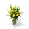 Sunlit yellow roses and cheerful gerbera-like daisies meet crisp white lilies in