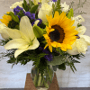 (ALL-ROUND) Sunflowers with an assortment of other flowers, giving it a soft