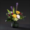 Gorgeous green glass bottle vase with roses, liatris, godetia, helleborus, ranunculus, and