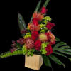 A dramatic floral arrangement centered on spiky orange protea-like blooms and deep