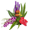 A graceful modern funeral spray of warm colors, it includes flowers such