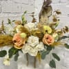 Peach and white rose arrangement in a white hatbox with dried accents
