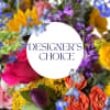 Let our talented designer make a beautiful bright arrangement with fresh and