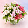 Soft, sweet, and effortlessly elegant, Blushing Petals features a lush gathering of