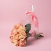 Pale pink and cream roses-soft as cotton candy-creates a romantic, intimate bouquet