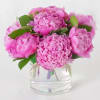 Indulge in the timeless beauty of Pretty in Peony, a breathtaking arrangement