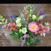 A lively, garden-fresh floral arrangement that feels like a sunny spring day
