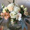Peach bouquet with alstroemeria, roses, and hydrangeas. 
