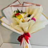 Sunlit yellow lilies and crisp white chrysanthemums meet cheerful pink carnations and