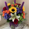 Sweet arrangement with a variety of flowers