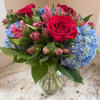 Beautiful blue Hydrangeas, vibrant red Roses....How can you go wrong?