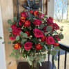 A stunning arrangement made using 80 Roses in colors of your choice!