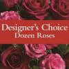 Dozen roses in shades of pink and red with a text banner across the center