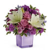 These luxurious lavender roses and crisp white lilies are poised to please!