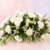 Peaceful Garden Tribute is a graceful silk sympathy arrangement designed in soft