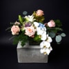 Soft pastel floral mix in a variety of texture and depth accented