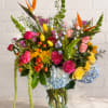 This extra-large arrangement will bring color and smiles to the room! 
Peonies