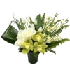 White roses, tulips, and green orchids in a dark vase
