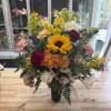 Sprintime colors in longer-lasting blooms will grace your loved one's resting place.