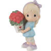 Presenting a heart-shaped rose bouquet to someone special, this blonde sweetheart makes