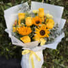 A luminous one-faced luxury wrapped bouquet of sunflowers and golden yellow roses