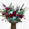 Assorted selection of blooms. Modern one sided design in a 5x5 white