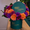 A striking luxury box arrangement designed with a vivid mix of premium